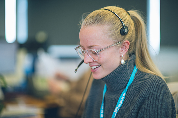 Customer Service Adviser talking on a headset