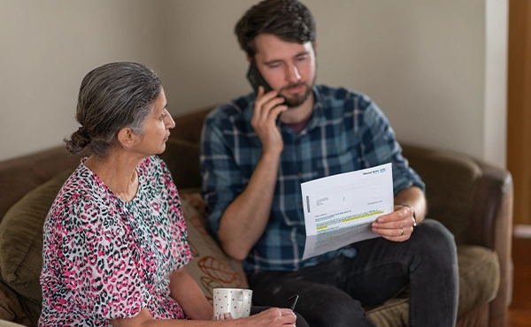 Customers on the phone discussing their water bill